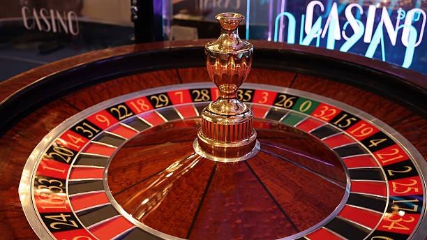 Live match results displayed on asiabet118 login mobile app with blackjack table in background